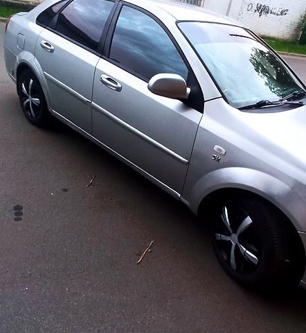 Серый Шевроле Лачетти, объемом двигателя 1.8 л и пробегом 325 тыс. км за 2600 $, фото 1 на Automoto.ua