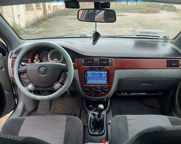 Серый Шевроле Лачетти, объемом двигателя 1.8 л и пробегом 318 тыс. км за 3900 $, фото 7 на Automoto.ua