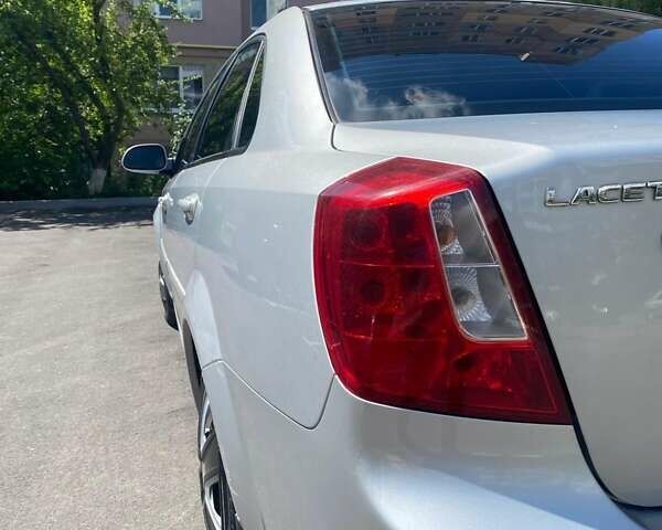 Серый Шевроле Лачетти, объемом двигателя 1.8 л и пробегом 165 тыс. км за 4999 $, фото 7 на Automoto.ua