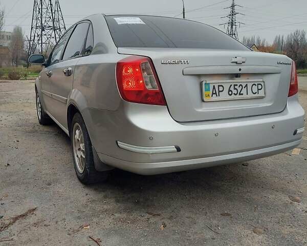 Серый Шевроле Лачетти, объемом двигателя 1.8 л и пробегом 318 тыс. км за 3900 $, фото 4 на Automoto.ua