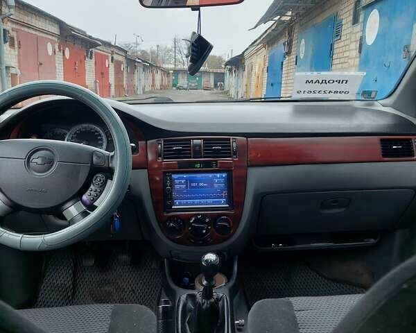 Сірий Шевроле Лачетті, об'ємом двигуна 1.8 л та пробігом 318 тис. км за 4200 $, фото 6 на Automoto.ua