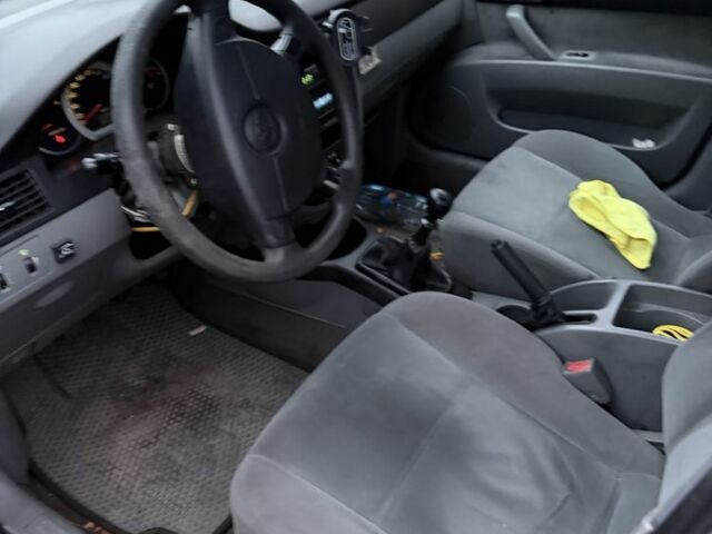 Серый Шевроле Лачетти, объемом двигателя 1.6 л и пробегом 200 тыс. км за 1600 $, фото 4 на Automoto.ua