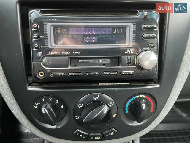 Серый Шевроле Лачетти, объемом двигателя 1.6 л и пробегом 144 тыс. км за 5300 $, фото 40 на Automoto.ua