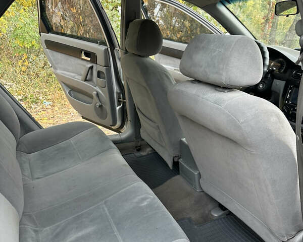 Серый Шевроле Лачетти, объемом двигателя 1.6 л и пробегом 255 тыс. км за 3600 $, фото 17 на Automoto.ua