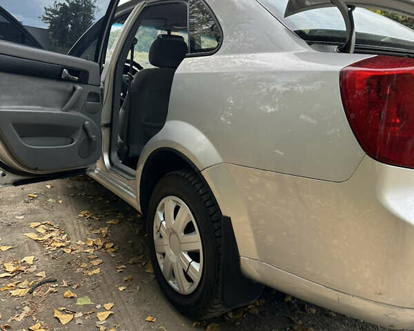 Серый Шевроле Лачетти, объемом двигателя 1.6 л и пробегом 255 тыс. км за 3600 $, фото 18 на Automoto.ua