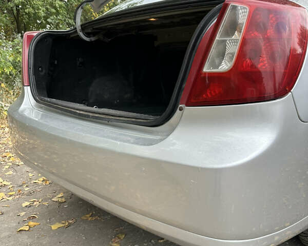 Серый Шевроле Лачетти, объемом двигателя 1.6 л и пробегом 255 тыс. км за 3600 $, фото 39 на Automoto.ua