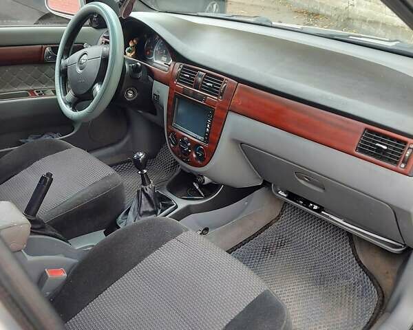 Сірий Шевроле Лачетті, об'ємом двигуна 1.8 л та пробігом 318 тис. км за 4200 $, фото 8 на Automoto.ua