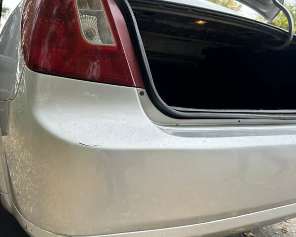 Серый Шевроле Лачетти, объемом двигателя 1.6 л и пробегом 255 тыс. км за 3600 $, фото 40 на Automoto.ua