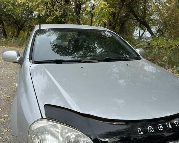 Серый Шевроле Лачетти, объемом двигателя 1.6 л и пробегом 255 тыс. км за 3600 $, фото 5 на Automoto.ua