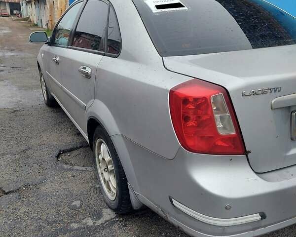 Сірий Шевроле Лачетті, об'ємом двигуна 1.8 л та пробігом 318 тис. км за 4200 $, фото 2 на Automoto.ua