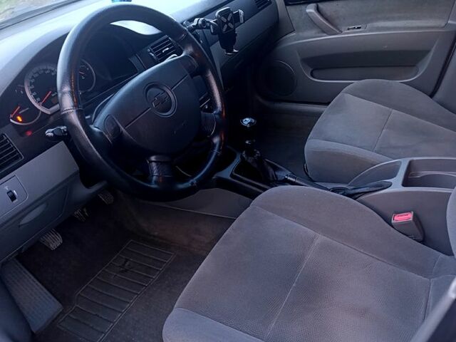 Серый Шевроле Лачетти, объемом двигателя 1.6 л и пробегом 260 тыс. км за 3300 $, фото 6 на Automoto.ua