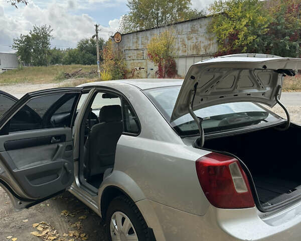 Серый Шевроле Лачетти, объемом двигателя 1.6 л и пробегом 255 тыс. км за 3600 $, фото 19 на Automoto.ua