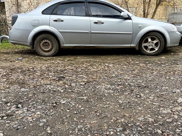 Серый Шевроле Лачетти, объемом двигателя 1.8 л и пробегом 313 тыс. км за 2800 $, фото 1 на Automoto.ua