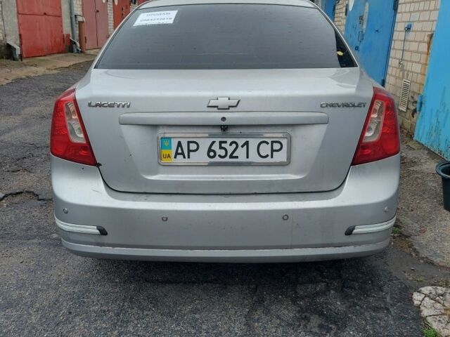 Серый Шевроле Лачетти, объемом двигателя 1.8 л и пробегом 318 тыс. км за 4400 $, фото 3 на Automoto.ua