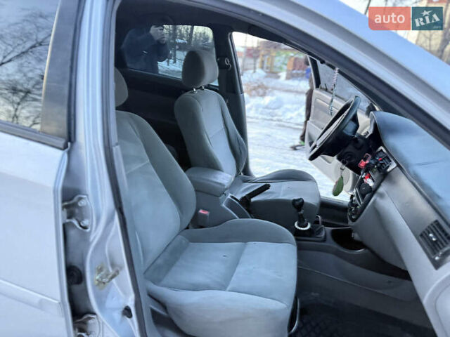 Серый Шевроле Лачетти, объемом двигателя 1.8 л и пробегом 300 тыс. км за 2350 $, фото 23 на Automoto.ua