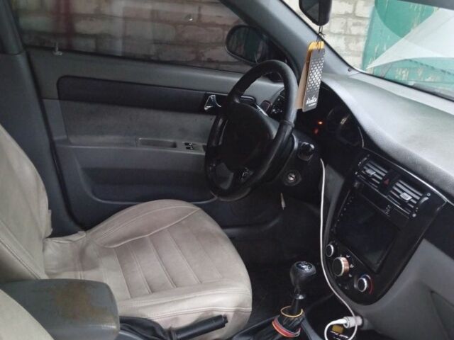 Серый Шевроле Лачетти, объемом двигателя 1.8 л и пробегом 355 тыс. км за 3499 $, фото 9 на Automoto.ua