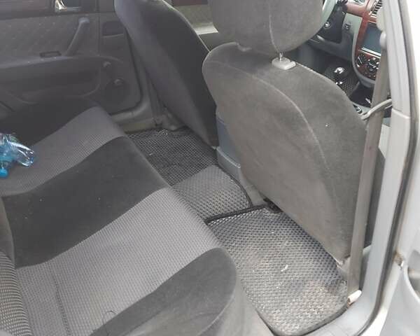 Сірий Шевроле Лачетті, об'ємом двигуна 1.8 л та пробігом 318 тис. км за 4200 $, фото 7 на Automoto.ua