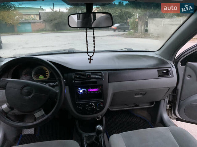 Серый Шевроле Лачетти, объемом двигателя 1.8 л и пробегом 294 тыс. км за 2600 $, фото 11 на Automoto.ua