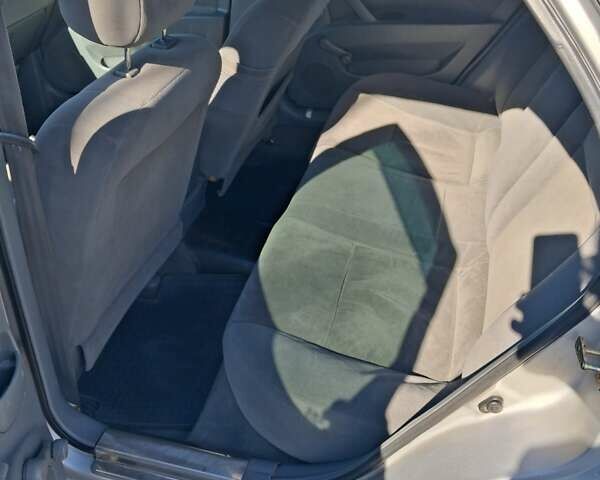 Серый Шевроле Лачетти, объемом двигателя 1.6 л и пробегом 224 тыс. км за 3500 $, фото 13 на Automoto.ua