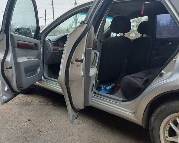 Серый Шевроле Лачетти, объемом двигателя 1.8 л и пробегом 318 тыс. км за 3900 $, фото 6 на Automoto.ua