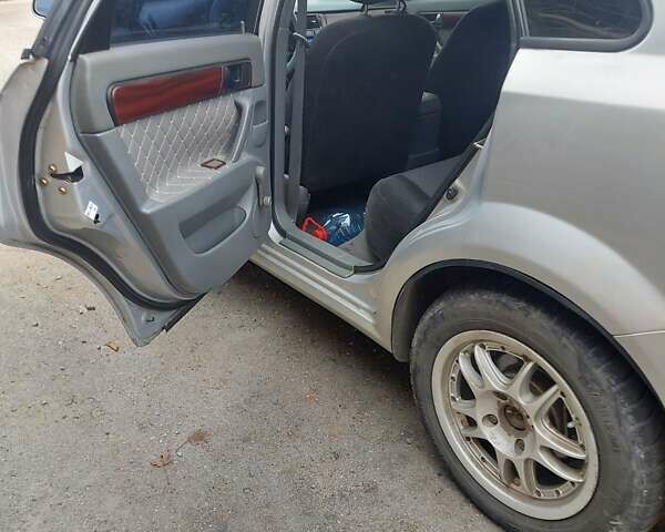 Серый Шевроле Лачетти, объемом двигателя 1.8 л и пробегом 318 тыс. км за 3900 $, фото 8 на Automoto.ua