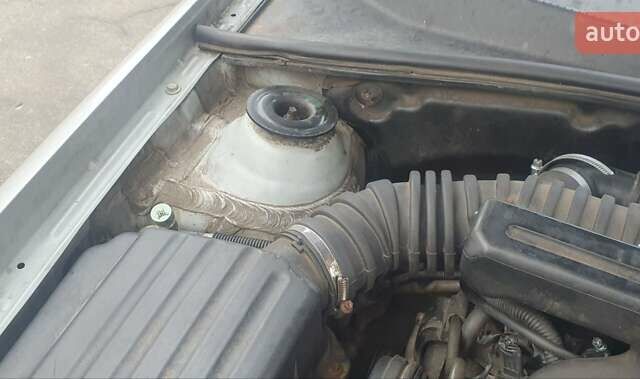 Серый Шевроле Лачетти, объемом двигателя 1.8 л и пробегом 227 тыс. км за 4000 $, фото 14 на Automoto.ua