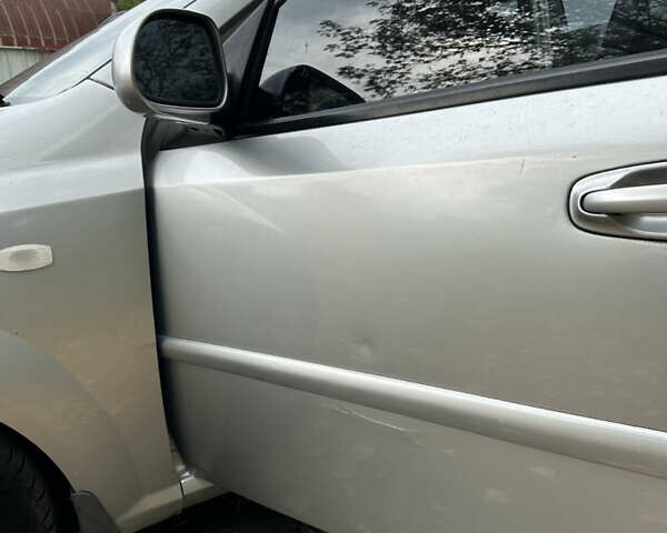 Серый Шевроле Лачетти, объемом двигателя 1.6 л и пробегом 255 тыс. км за 3600 $, фото 28 на Automoto.ua