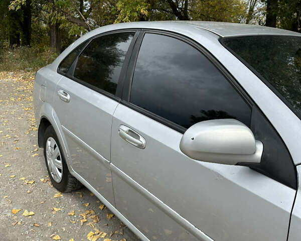 Серый Шевроле Лачетти, объемом двигателя 1.6 л и пробегом 255 тыс. км за 3600 $, фото 3 на Automoto.ua