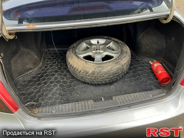 Серый Шевроле Лачетти, объемом двигателя 1.8 л и пробегом 313 тыс. км за 2800 $, фото 7 на Automoto.ua