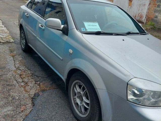 Серый Шевроле Лачетти, объемом двигателя 1.8 л и пробегом 318 тыс. км за 4400 $, фото 1 на Automoto.ua