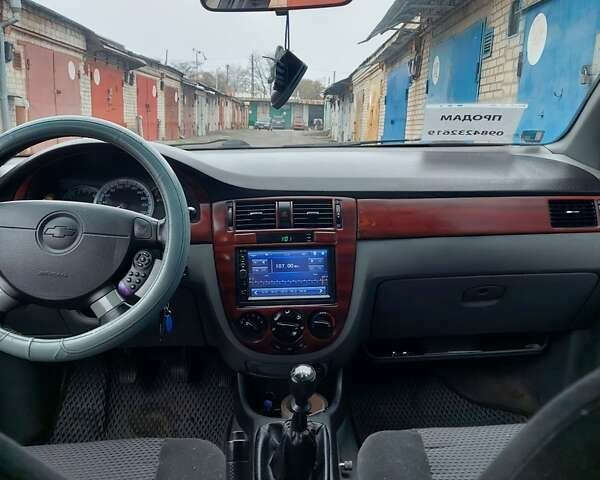 Серый Шевроле Лачетти, объемом двигателя 1.8 л и пробегом 318 тыс. км за 3900 $, фото 10 на Automoto.ua