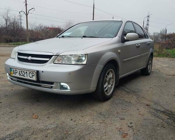 Серый Шевроле Лачетти, объемом двигателя 1.8 л и пробегом 318 тыс. км за 3900 $, фото 2 на Automoto.ua
