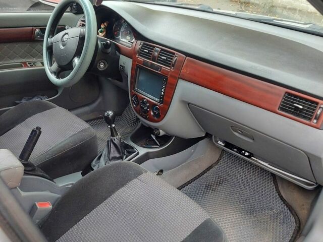 Серый Шевроле Лачетти, объемом двигателя 1.8 л и пробегом 318 тыс. км за 4400 $, фото 12 на Automoto.ua