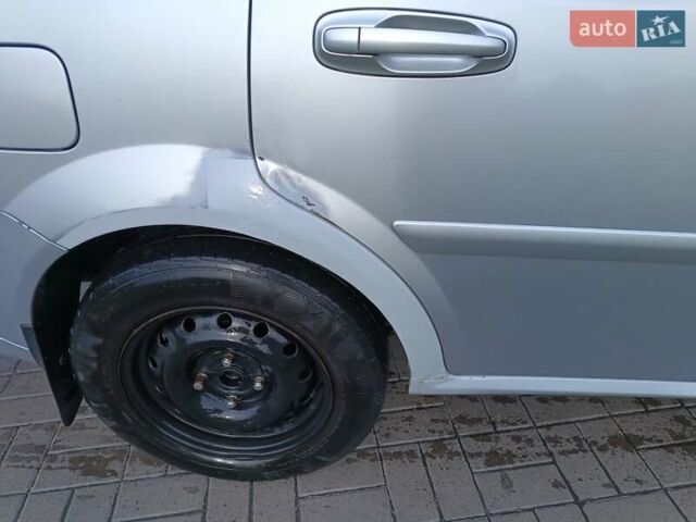 Серый Шевроле Лачетти, объемом двигателя 1.8 л и пробегом 459 тыс. км за 2999 $, фото 3 на Automoto.ua