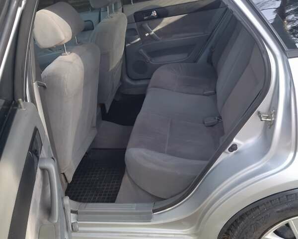 Сірий Шевроле Лачетті, об'ємом двигуна 1.8 л та пробігом 287 тис. км за 4500 $, фото 7 на Automoto.ua