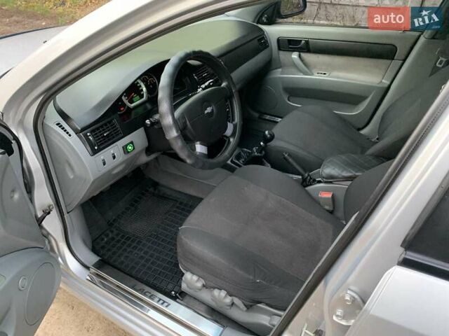 Серый Шевроле Лачетти, объемом двигателя 1.6 л и пробегом 214 тыс. км за 4900 $, фото 11 на Automoto.ua