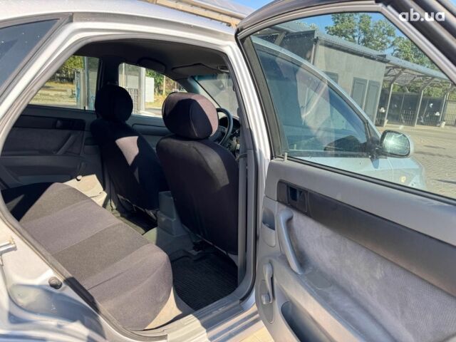 Серый Шевроле Лачетти, объемом двигателя 1.6 л и пробегом 167 тыс. км за 4990 $, фото 10 на Automoto.ua