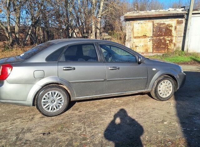 Серый Шевроле Лачетти, объемом двигателя 1.8 л и пробегом 260 тыс. км за 3100 $, фото 5 на Automoto.ua