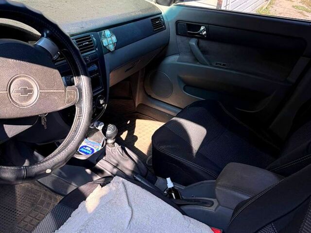 Серый Шевроле Лачетти, объемом двигателя 1.8 л и пробегом 149 тыс. км за 5000 $, фото 6 на Automoto.ua