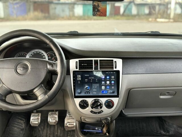 Серый Шевроле Лачетти, объемом двигателя 1.8 л и пробегом 210 тыс. км за 4499 $, фото 7 на Automoto.ua