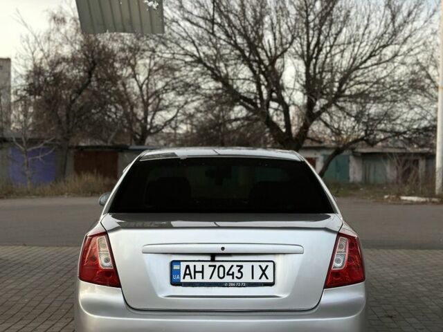 Серый Шевроле Лачетти, объемом двигателя 1.8 л и пробегом 210 тыс. км за 4499 $, фото 4 на Automoto.ua