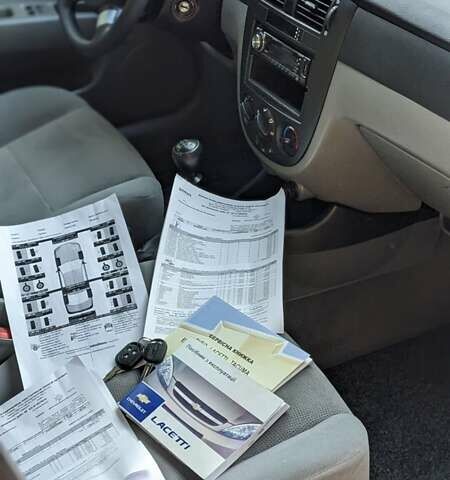 Серый Шевроле Лачетти, объемом двигателя 1.6 л и пробегом 195 тыс. км за 4500 $, фото 13 на Automoto.ua