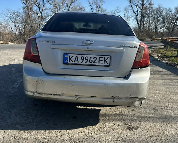 Серый Шевроле Лачетти, объемом двигателя 1.8 л и пробегом 232 тыс. км за 3300 $, фото 2 на Automoto.ua