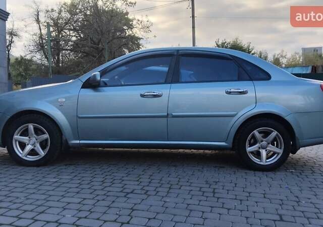 Сірий Шевроле Лачетті, об'ємом двигуна 1.8 л та пробігом 250 тис. км за 4100 $, фото 4 на Automoto.ua