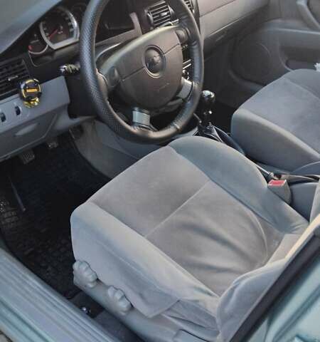 Сірий Шевроле Лачетті, об'ємом двигуна 1.8 л та пробігом 250 тис. км за 4100 $, фото 14 на Automoto.ua