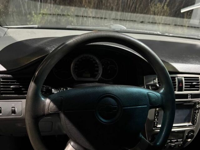 Серый Шевроле Лачетти, объемом двигателя 1.8 л и пробегом 244 тыс. км за 3100 $, фото 10 на Automoto.ua