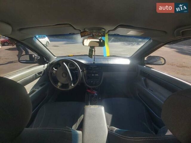 Серый Шевроле Лачетти, объемом двигателя 1.6 л и пробегом 177 тыс. км за 4500 $, фото 7 на Automoto.ua