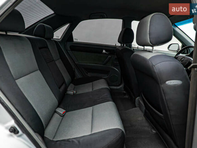 Серый Шевроле Лачетти, объемом двигателя 1.8 л и пробегом 127 тыс. км за 6404 $, фото 16 на Automoto.ua