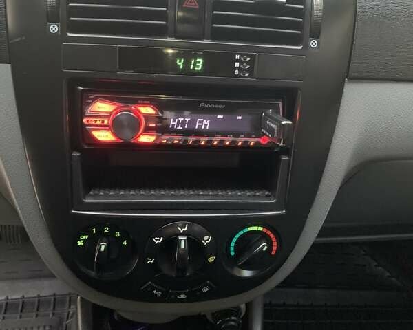 Серый Шевроле Лачетти, объемом двигателя 1.6 л и пробегом 214 тыс. км за 4900 $, фото 13 на Automoto.ua