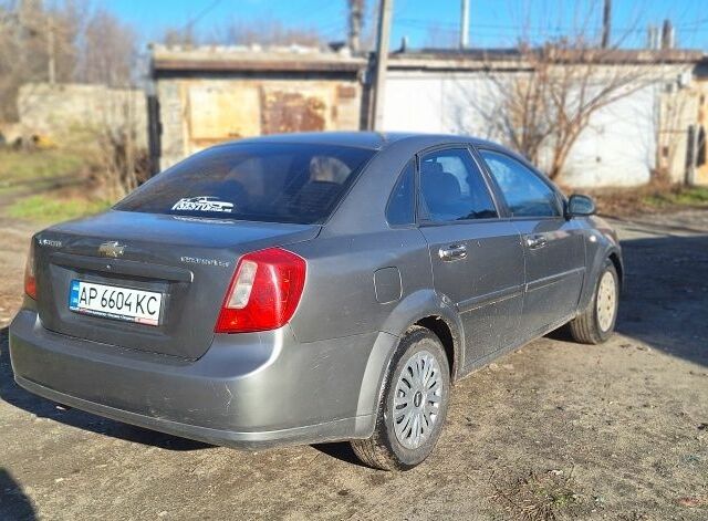 Серый Шевроле Лачетти, объемом двигателя 1.8 л и пробегом 260 тыс. км за 3100 $, фото 2 на Automoto.ua